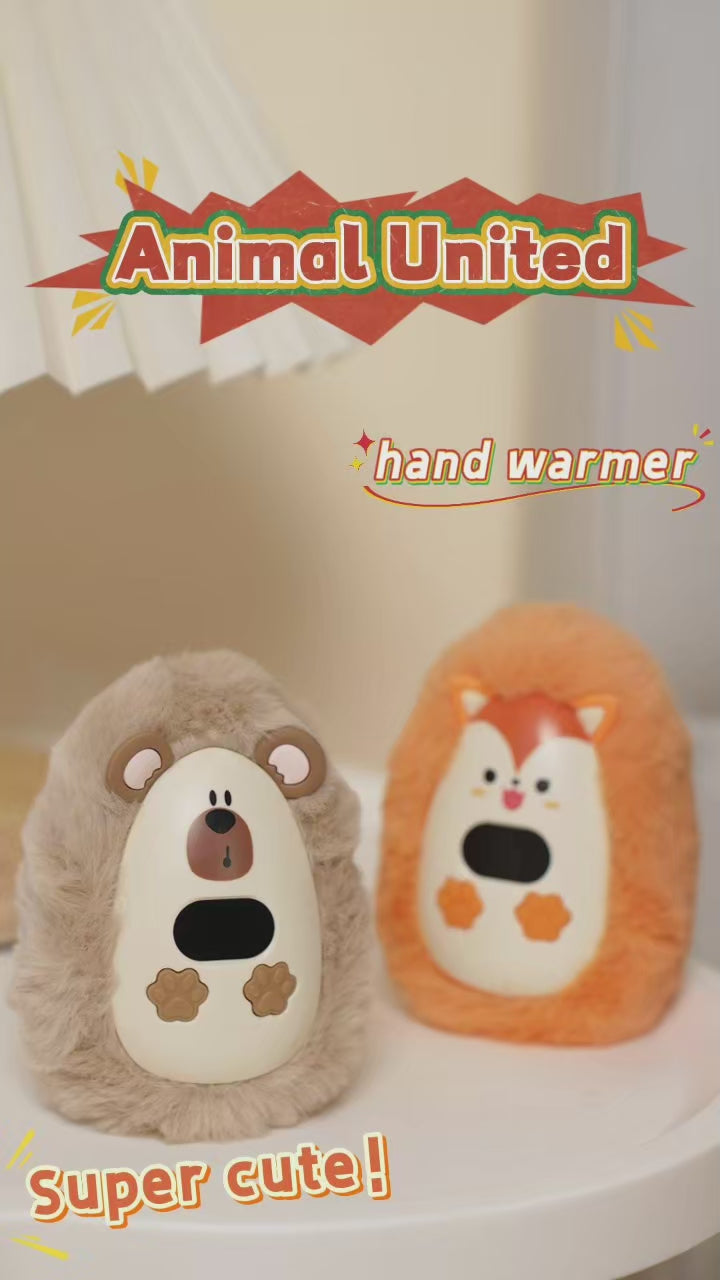 Load video: Calentador de manos WarmPaws en uso